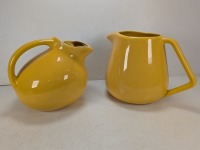 (2) Bauer Pitchers