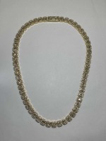 A 13-14K Yellow Gold and Natural Diamond Tennis Necklace (Pompano Beach, FL)