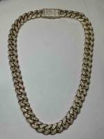 A 12K Yellow Gold and Natural Diamond Cuban Link Necklace (Pompano Beach, FL)