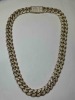 A 12K Yellow Gold and Natural Diamond Cuban Link Necklace (Pompano Beach, FL)