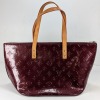 Handbag Marked "Louis Vuitton"