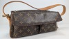 Handbag Marked "Louis Vuitton"