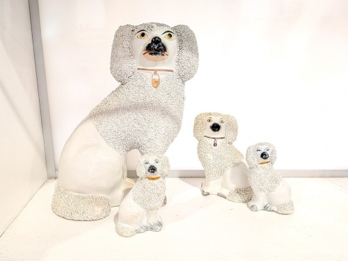 (4) Dog Figurines