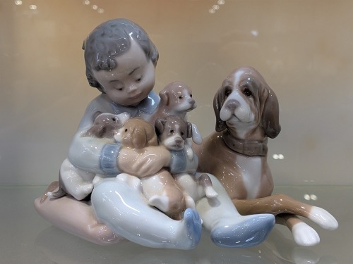 "Llardo" Child w/ Dog Figurine
