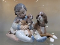 "Llardo" Child w/ Dog Figurine