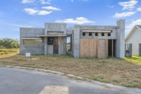 Lot with Unfinished Home